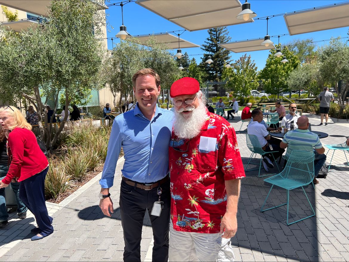 Summer Santa Dale with Calix, Inc President & CEO, Michael Weening, at company All-Hands gathering