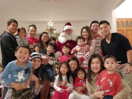 Group Photo with Santa Dale at home visit.