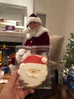Santa gets a Santa Cookie during a home visit